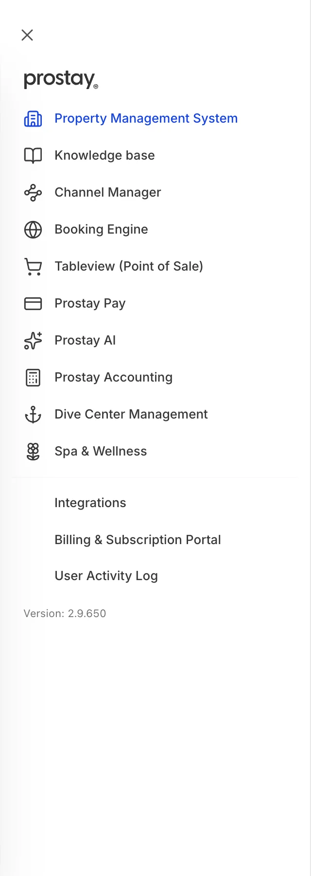 Die Modul-Leiste öffnet sich über dem Dashboard. Zehn Einträge mit Symbolen: „Property Management System“ in Blau, „Knowledge base“, „Channel Manager“, „Booking Engine,“, „Tableview (<span translate="no">Point of Sale)</span>“, „Prostay Pay“, „Prostay AI“, „Prostay Accounting“, „Dive Center Management“ und „Spa and Wellness.“. Unterhalb einer Trennlinie befinden sich drei Einträge ohne Symbole: „Integrations“, „Abrechnung & Abonnement“ und „User Activity Log“. Am Fuß der Seite befindet sich eine Versionsnummer.