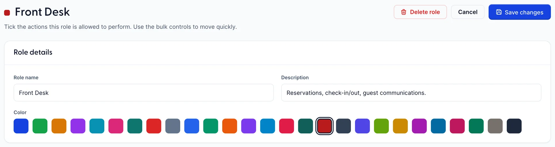 The top of the permission editor for the Front Desk role. A coloured square precedes the role name in the heading, with the line "Tick the actions this role is allowed to perform. Use the bulk controls to move quickly." Delete role, Cancel and Save changes buttons sit at the right. Below is a Role details card holding Role name, Description and a Color row of swatches.