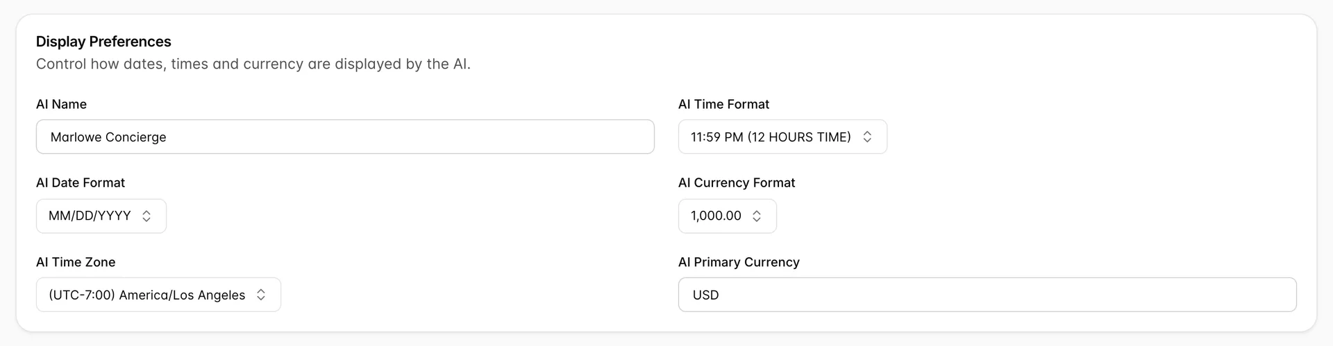 The Display Preferences card on General AI System Settings. AI Name reads Marlowe Concierge, AI Time Format reads 11:59 PM (12 HOURS TIME), AI Date Format reads MM/DD/YYYY, AI Currency Format reads 1,000.00, AI Time Zone reads (UTC-7:00) America/Los Angeles and AI Primary Currency reads USD.